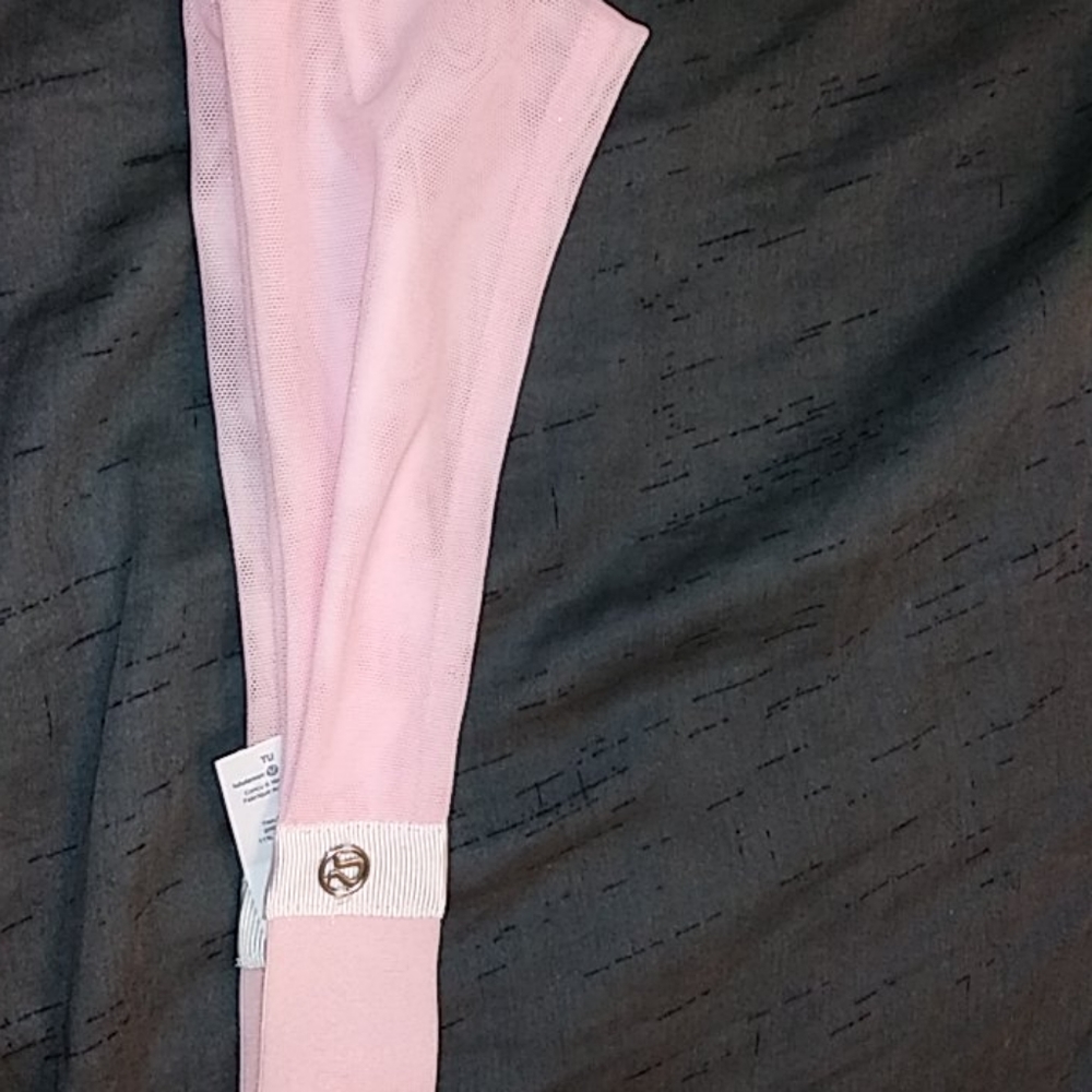 A pink lululemon headband